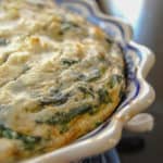 spinach and feta quiche in baking dish