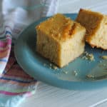 whole grain cornbread on teal plate