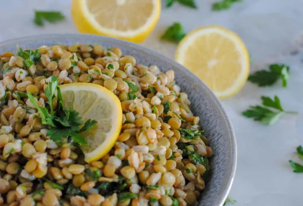 lentil and farro salad on marble background