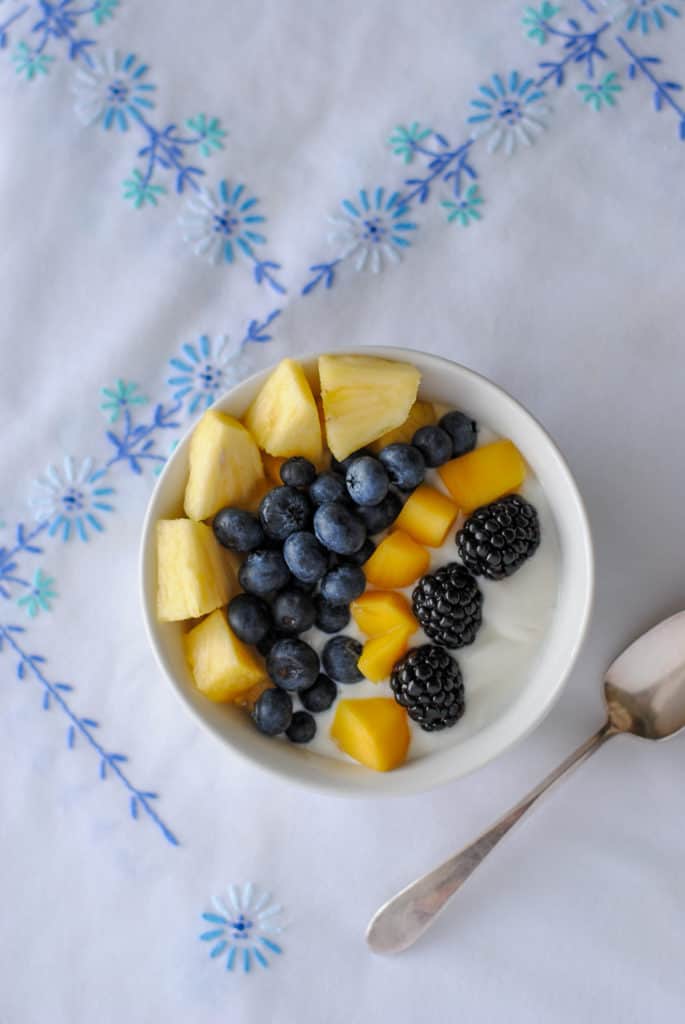 mangoes, blueberries, blackberries, pineapple - over yogurt