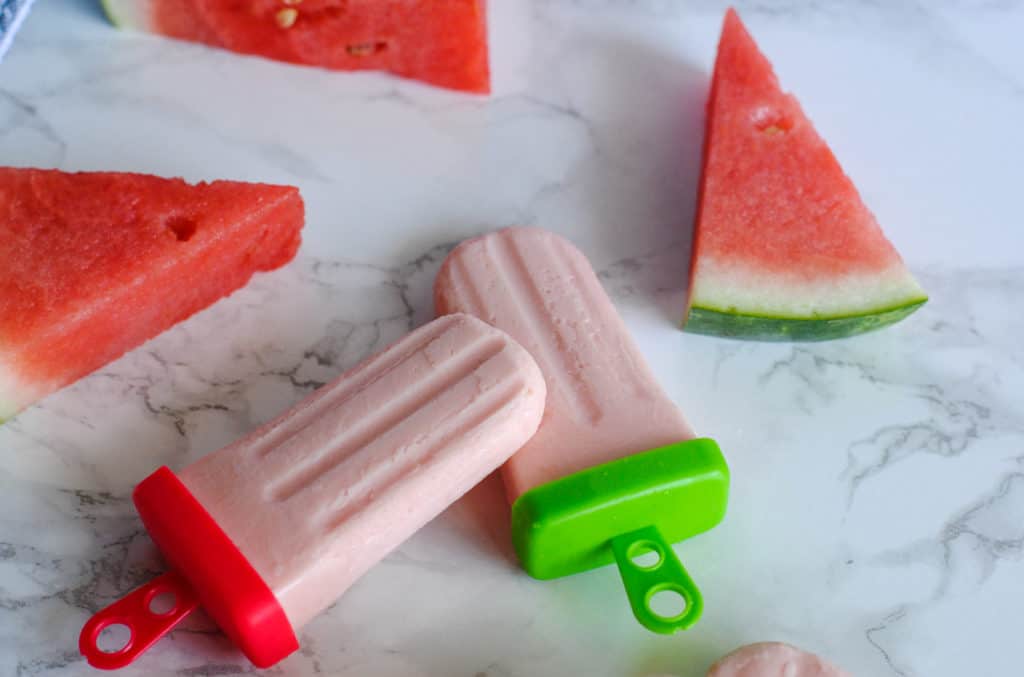 watermelon yogurt popsicles with fresh watermelon slices