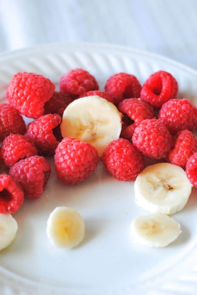 fresh raspberries and sliced banana